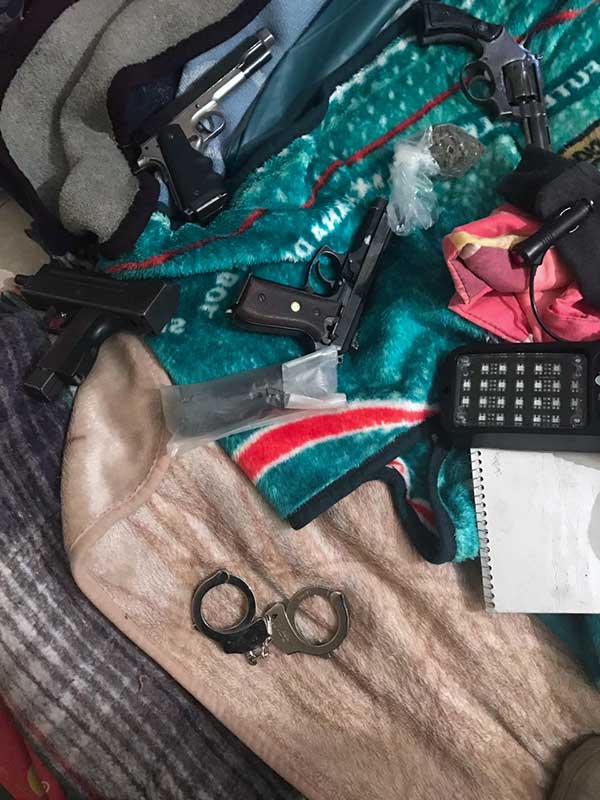 Catean inmueble en Cuautitlán Izcalli y aseguran cinco personas, armas y drogas